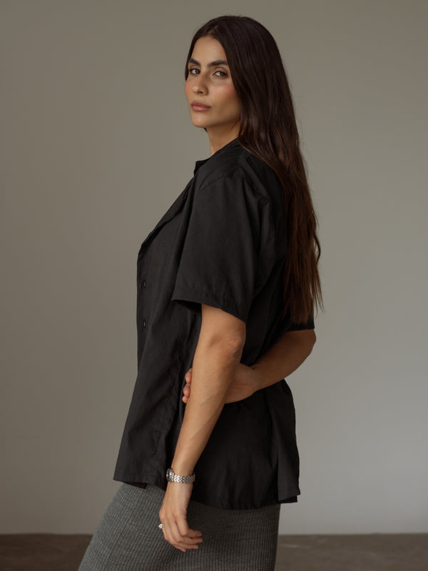 Vista posterior camisa oversized