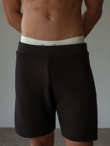 Short tejido color negro.