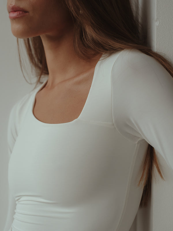 OPEN CURVE BODYSUIT - SOFT WHITE